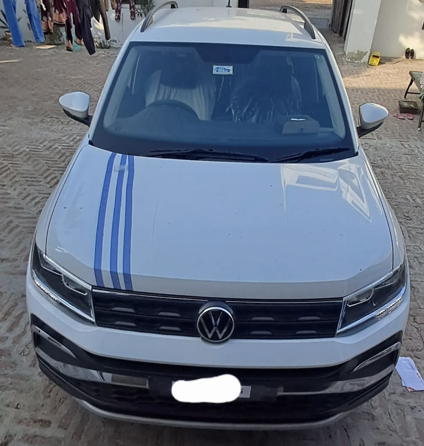 Manjinder with Volkswagen Taigun