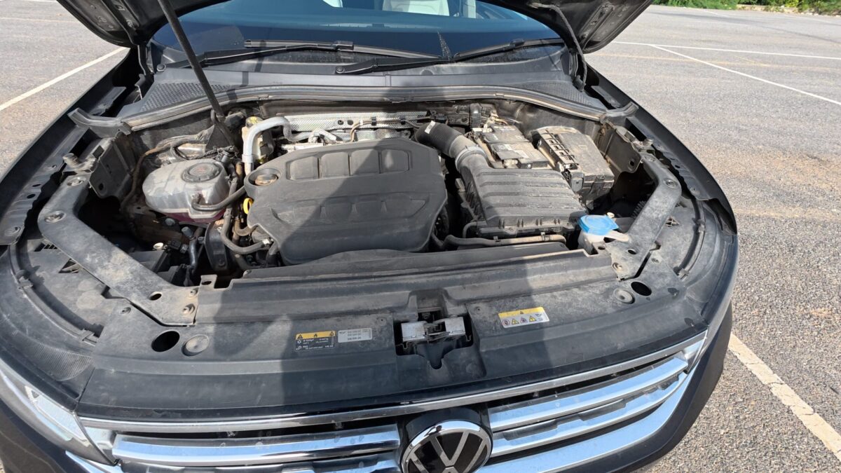 Engine bay inspection of new car