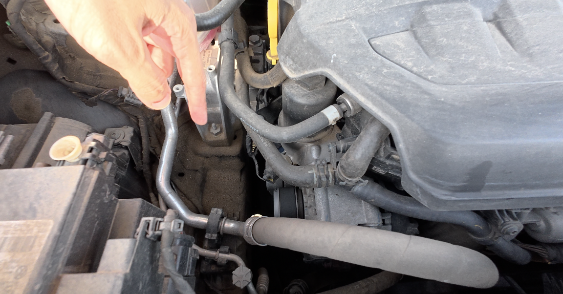 Checking fender and bonnet hinge bolts for spanner marks and paint overspray